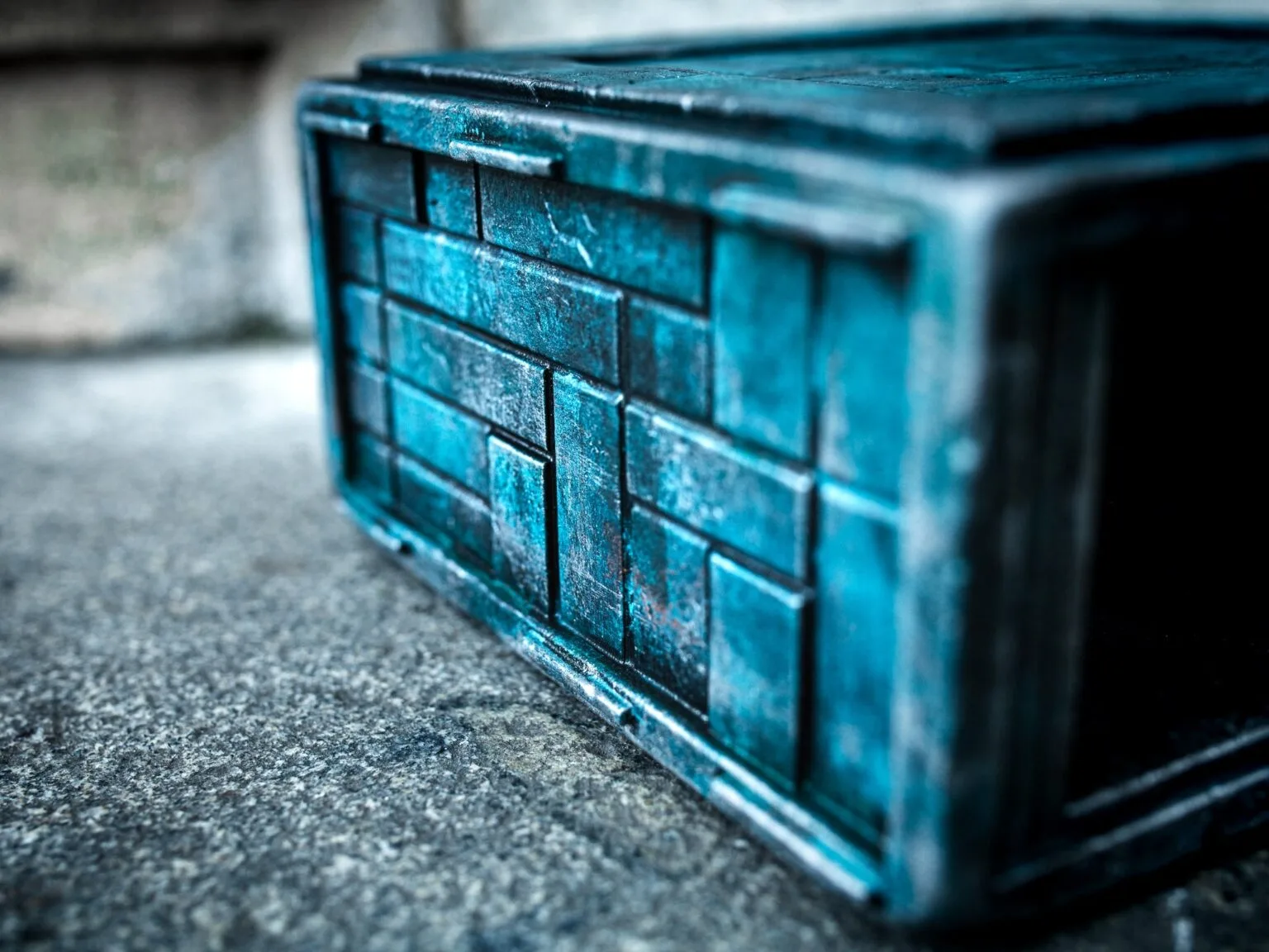 Close-up of Box of Pain STL, weathered blue metal texture, 3D printed cosplay prop detail