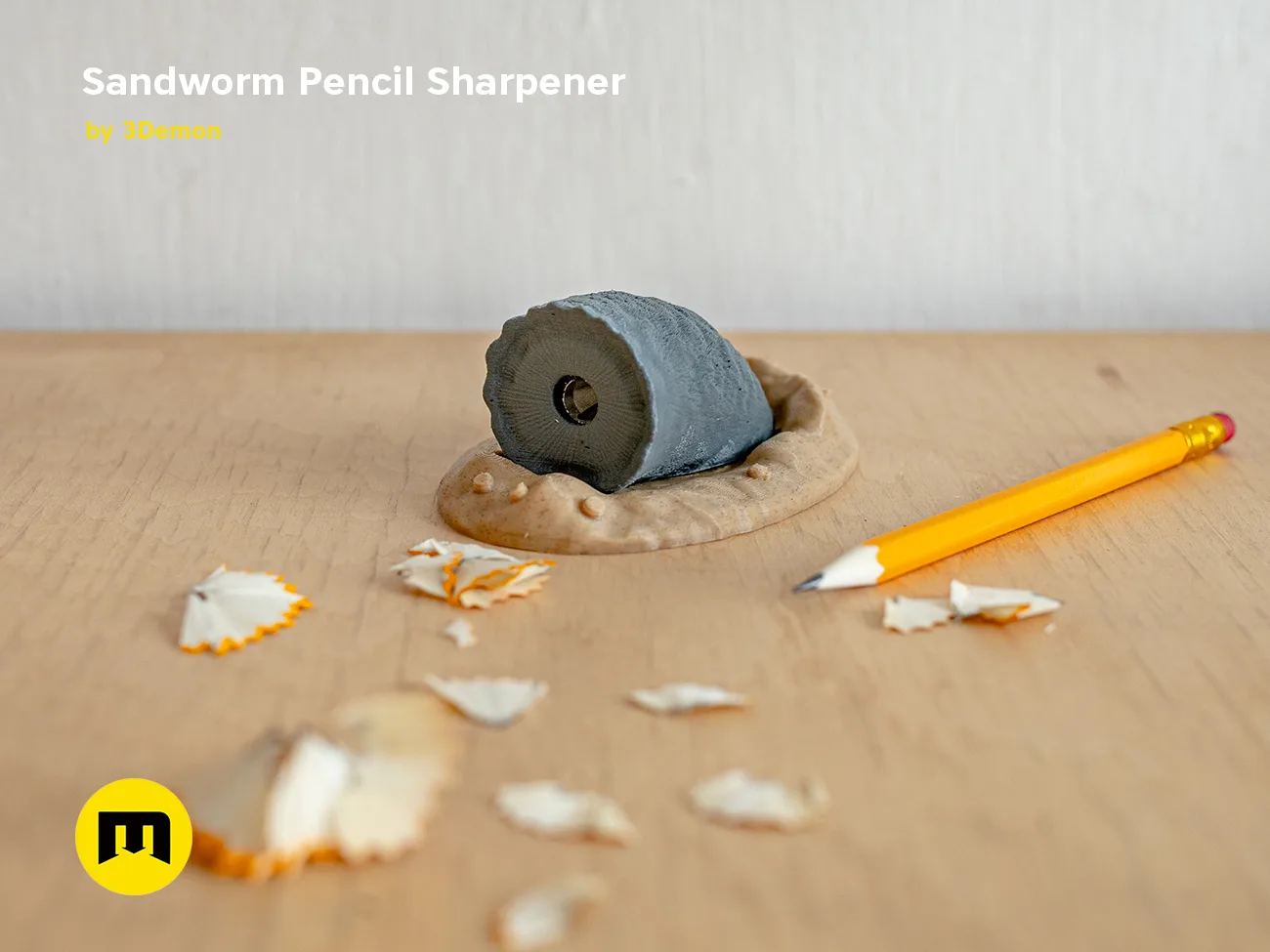 Lifestyle photo of Sandworm Pencil Sharpener 3D print, Dune-inspired design with pencil shavings.
