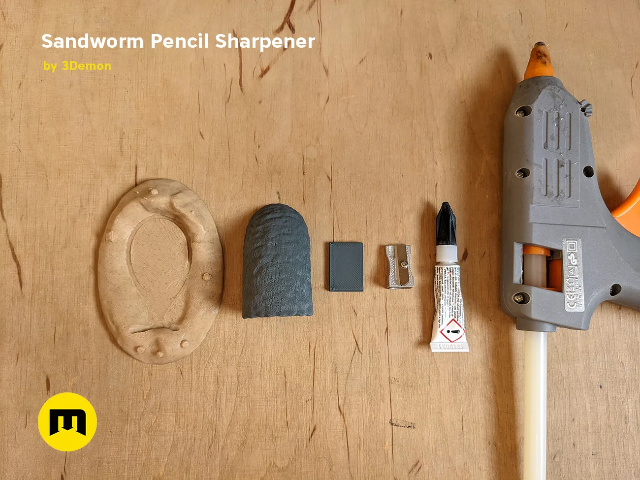 Disassembled parts of Sandworm Pencil Sharpener - Dune, 3D printed assembly guide with sanding block