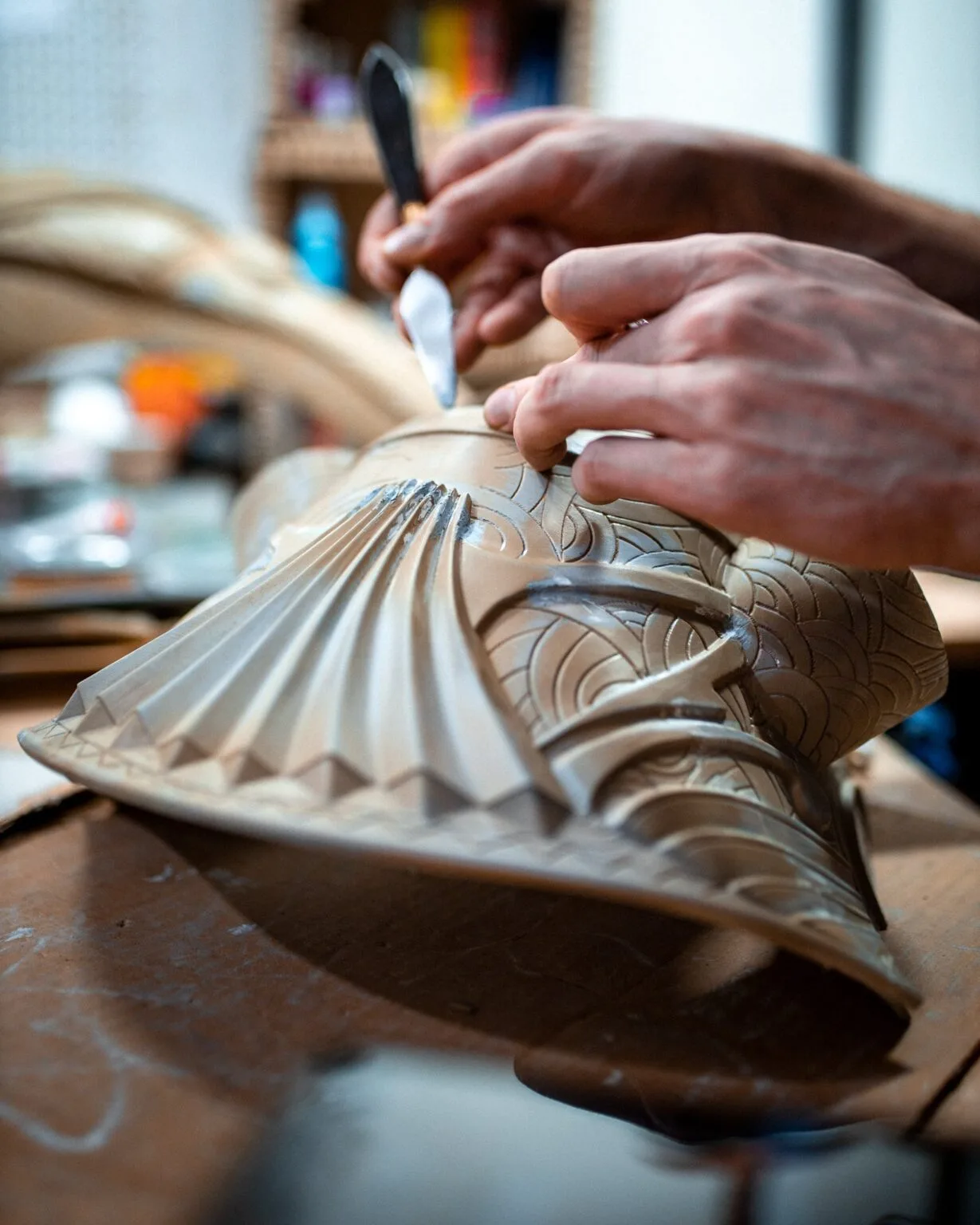 Hand photo of Horus Helmet STL, detailed 3D printed cosplay armor with intricate carvings