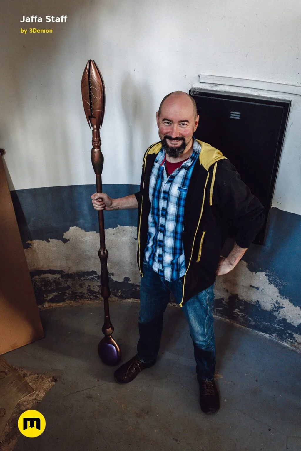 Hand photo of Ma'Tok Jaffa Staff 3D print, bronze staff with purple base, fantasy cosplay prop