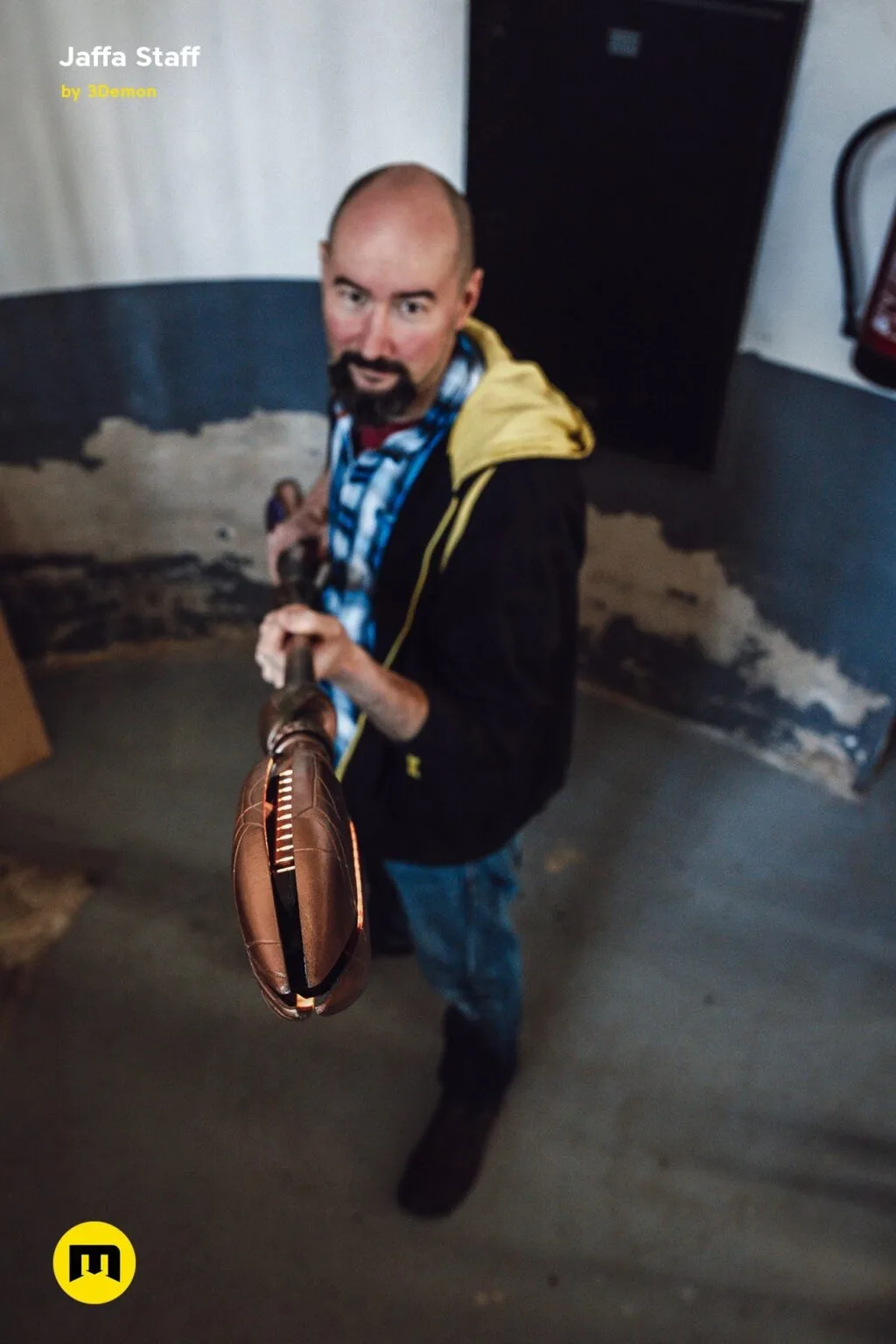 Hand photo of Ma'Tok Jaffa Staff 3D print, brown leather-wrapped hilt held by hand