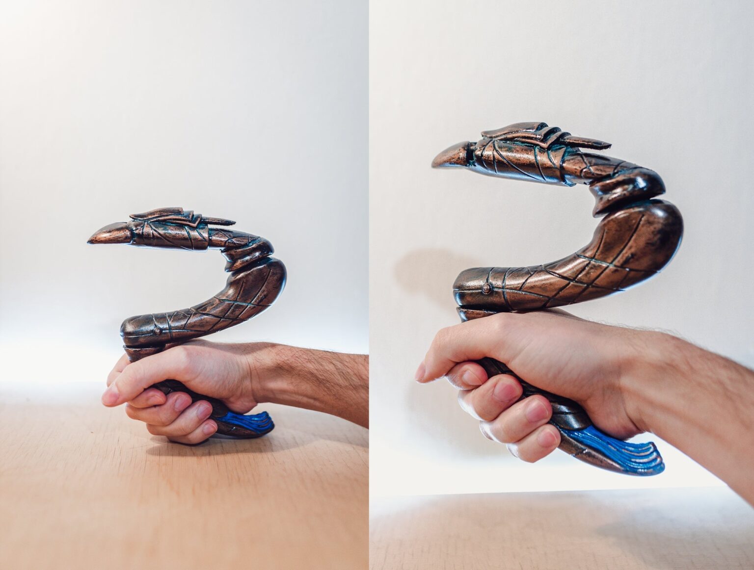 Hand photo of Zat'nik'tel Gun 3D printed prop, detailed claw-like grip, sci-fi weapon