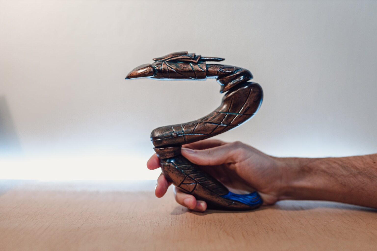 Hand photo of Zat'nik'tel Gun, claw-like grip 3D printed weapon cosplay prop