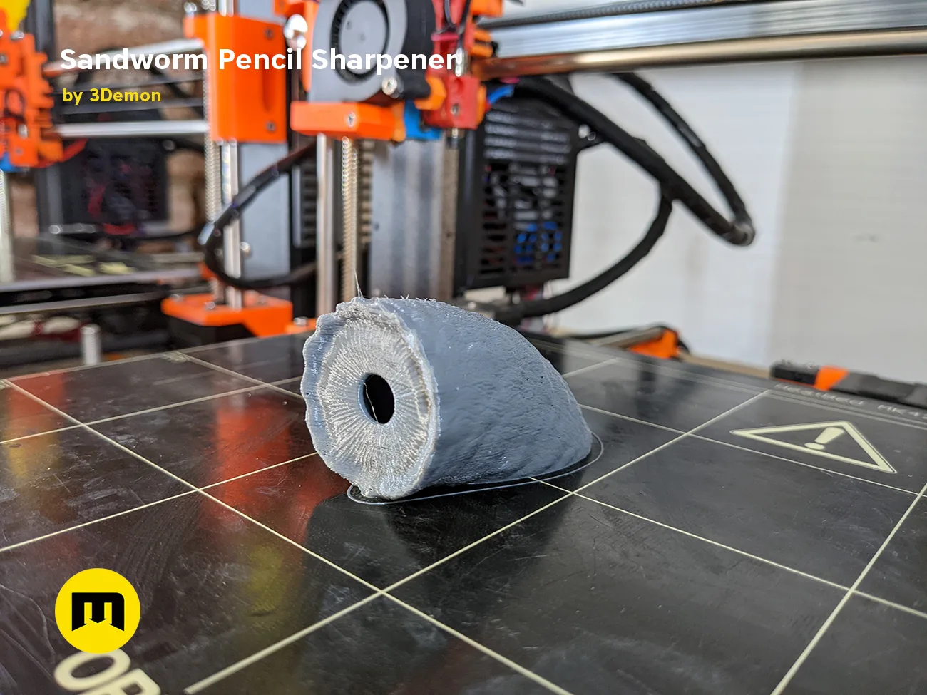 3D print preview of Sandworm Pencil Sharpener - Dune, grey sand-textured base with central hole