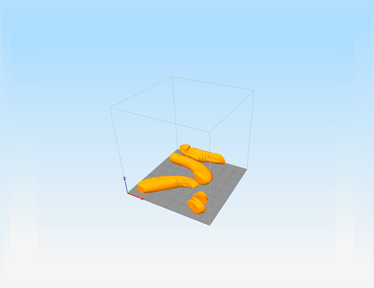 Slicer screenshot of Zat'nik'tel Gun STL, orange parts on print bed grid, 3D print