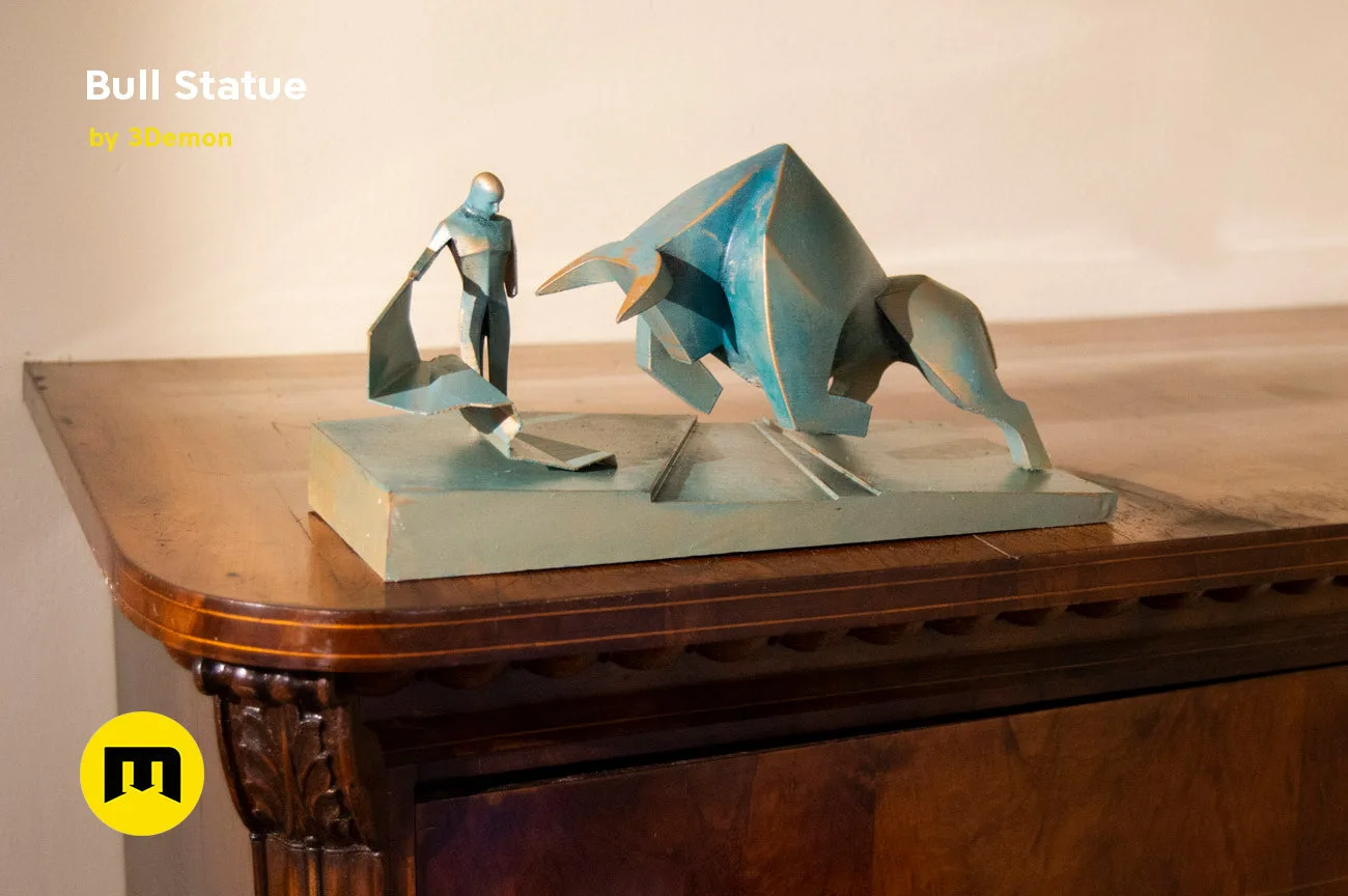 Lifestyle photo of Bull Statue - Dune, matte turquoise bull and matte grey matador 3D printed collectible figure