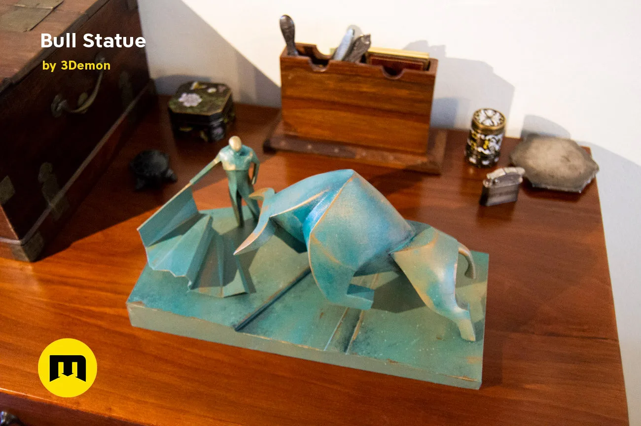 Lifestyle photo of 3D printed Bull Statue from Dune, matte green metallic finish, bull and rider detail