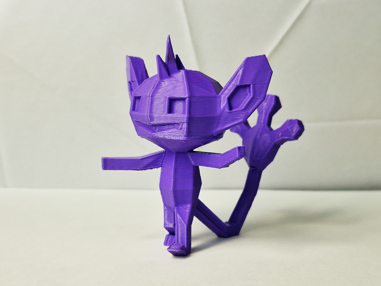 Printable 3D model of Aipom collectible figure, purple 3D print with detailed ears and tail.