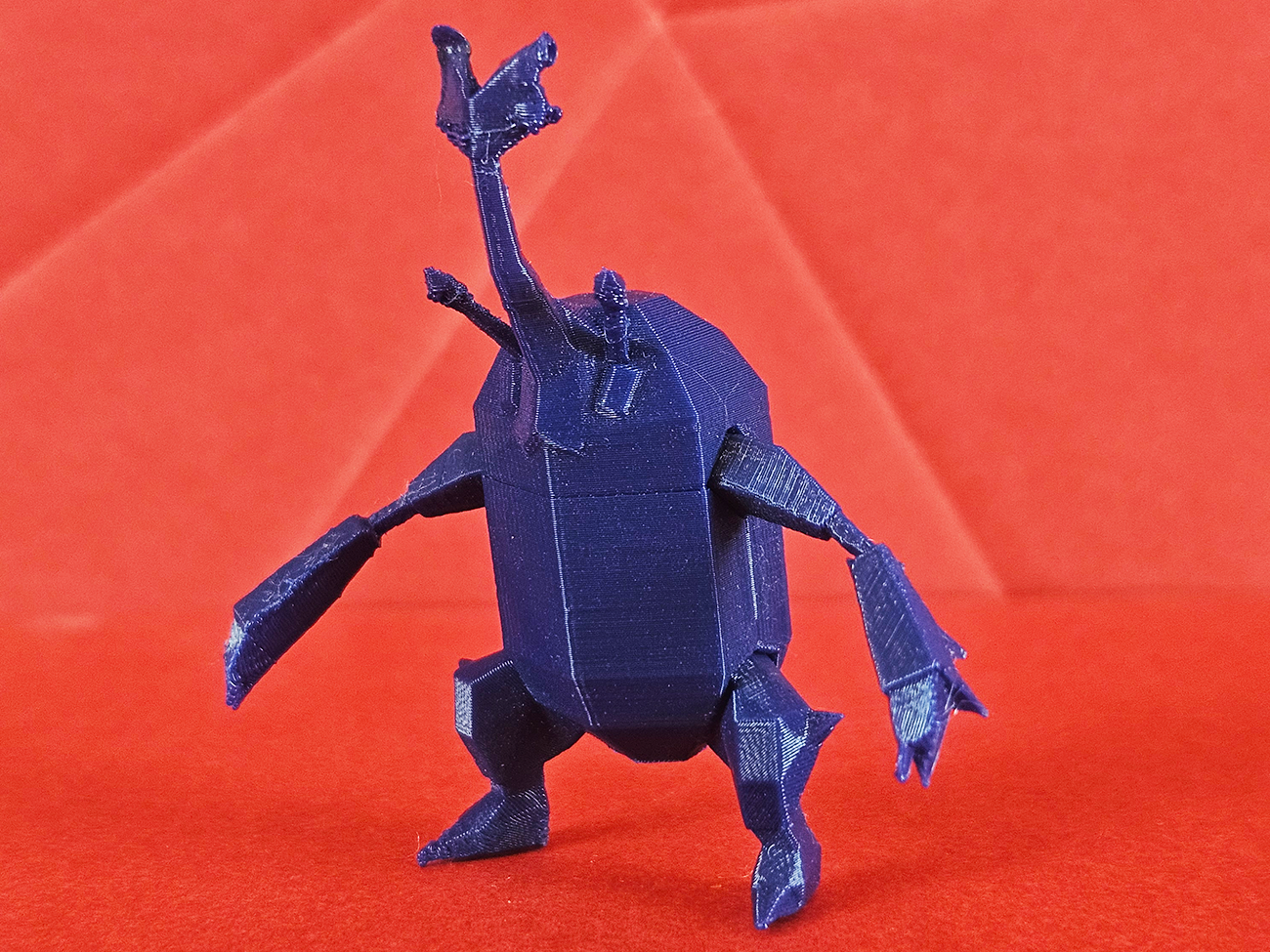 3D print preview of Heracross collectible figure, side view with detailed antennae and legs
