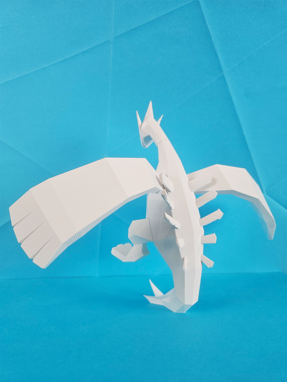 3D model render of Lugia, mythical Pokémon collectible figure, winged view
