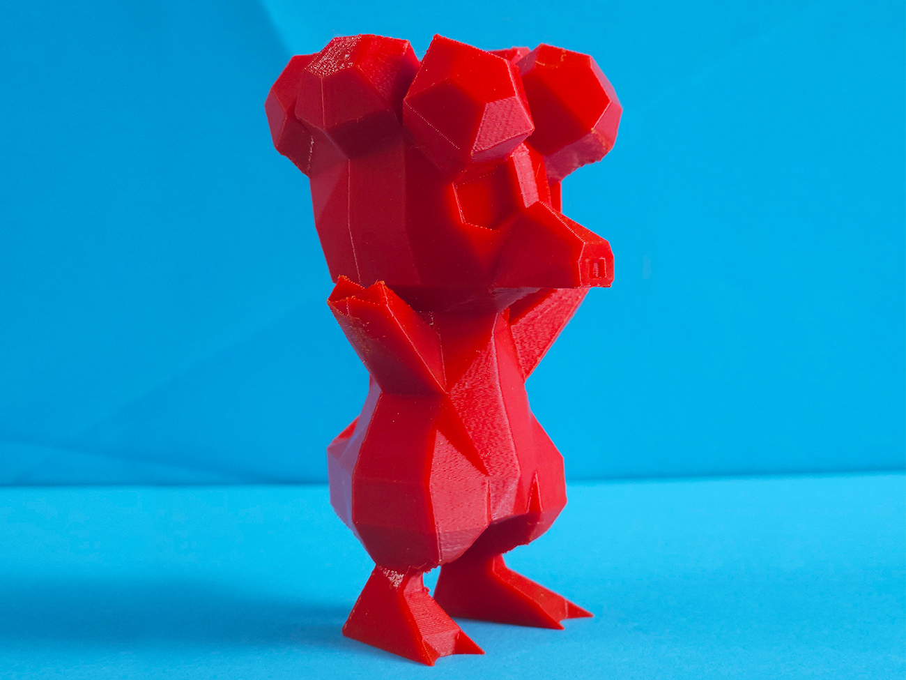 3D visualization of Magby STL, pixelated red 3D printed collectible figure
