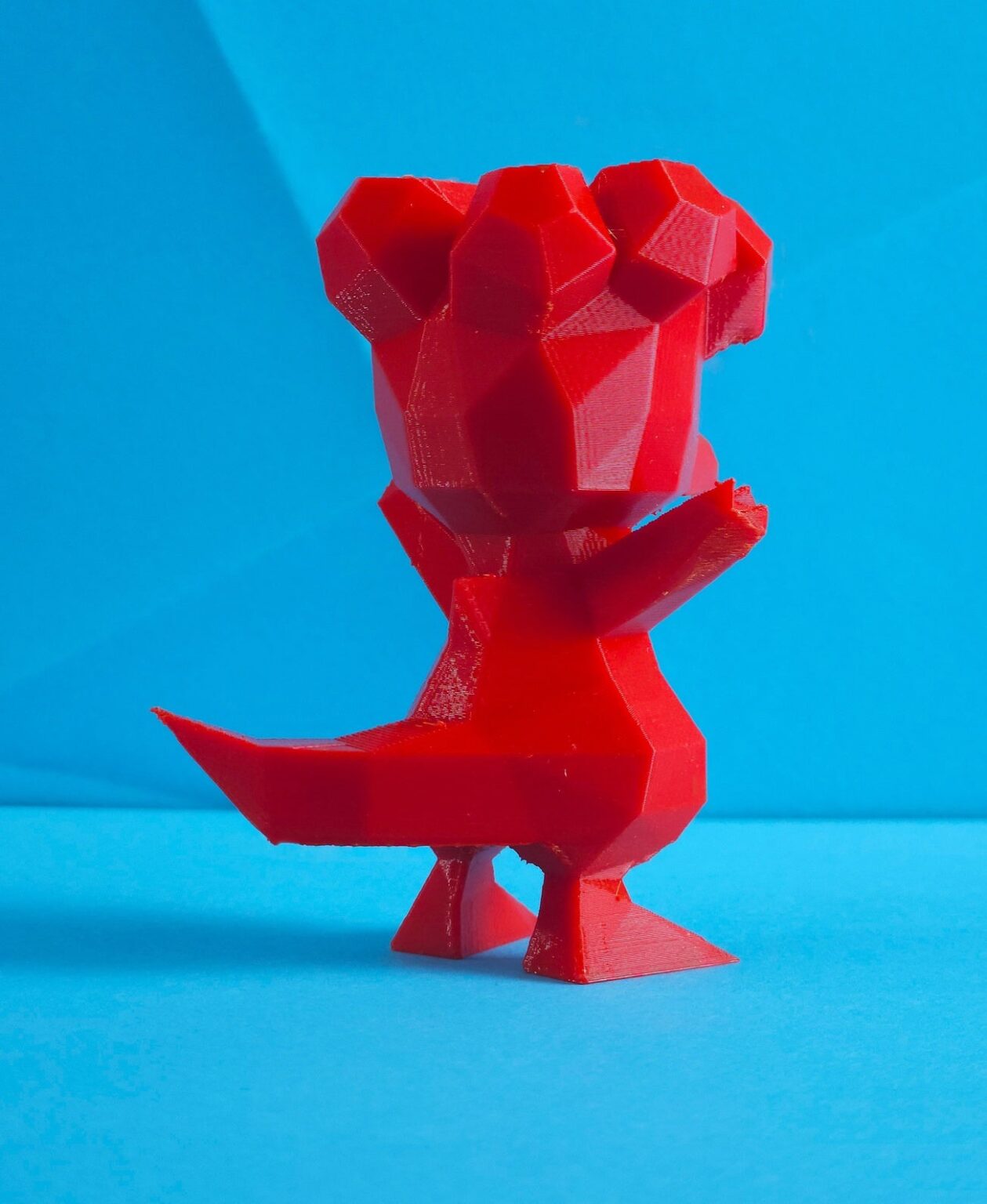 3D model render of Magby, red 3D print collectible figure, front view