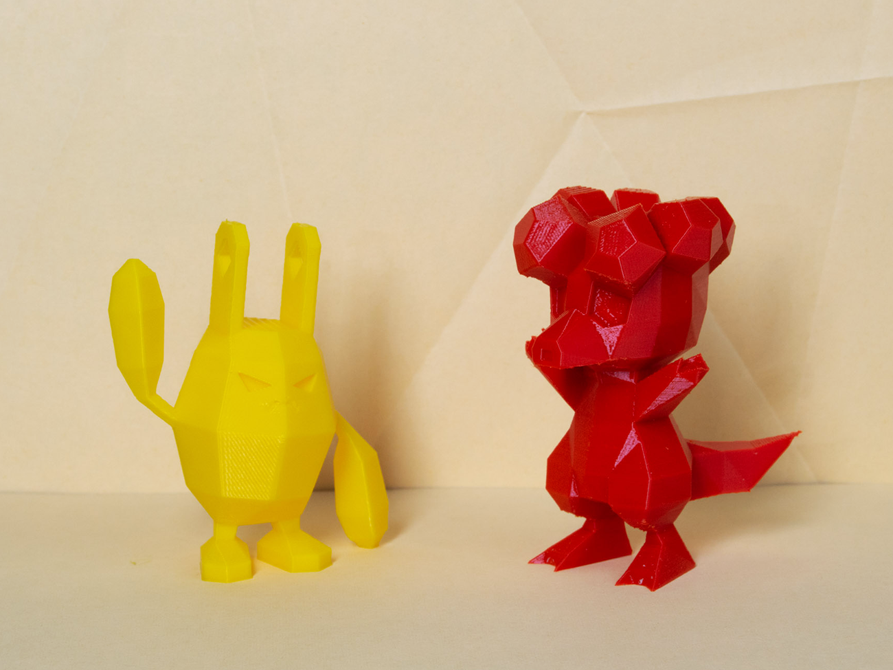 Color-coded parts breakdown of Magby STL, yellow and red Pokémon collectible figure assembly guide