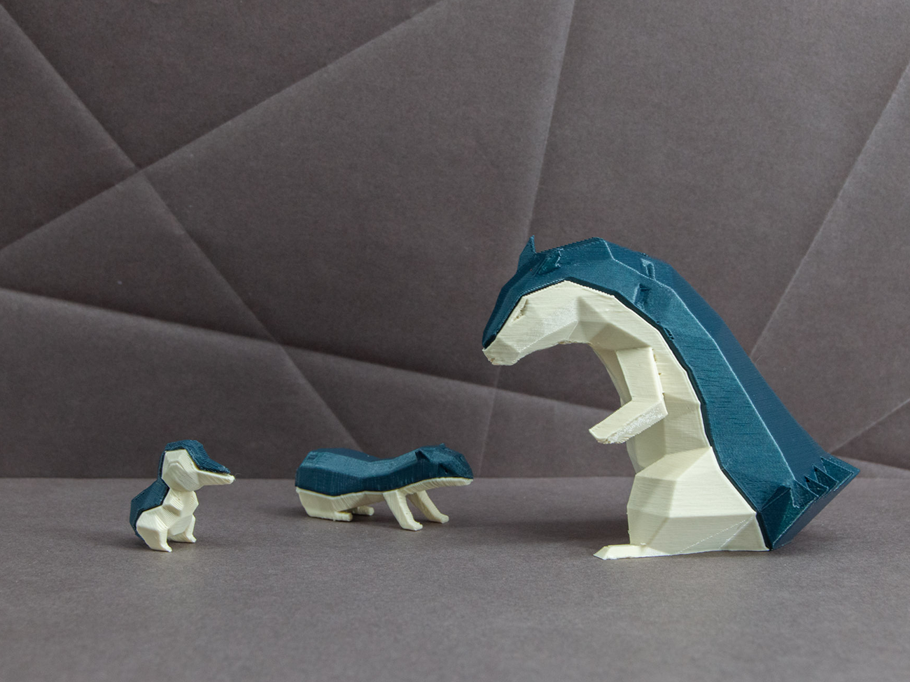 Exploded view of Typhlosion 3D print, color-coded parts breakdown for Pokémon collectible figure