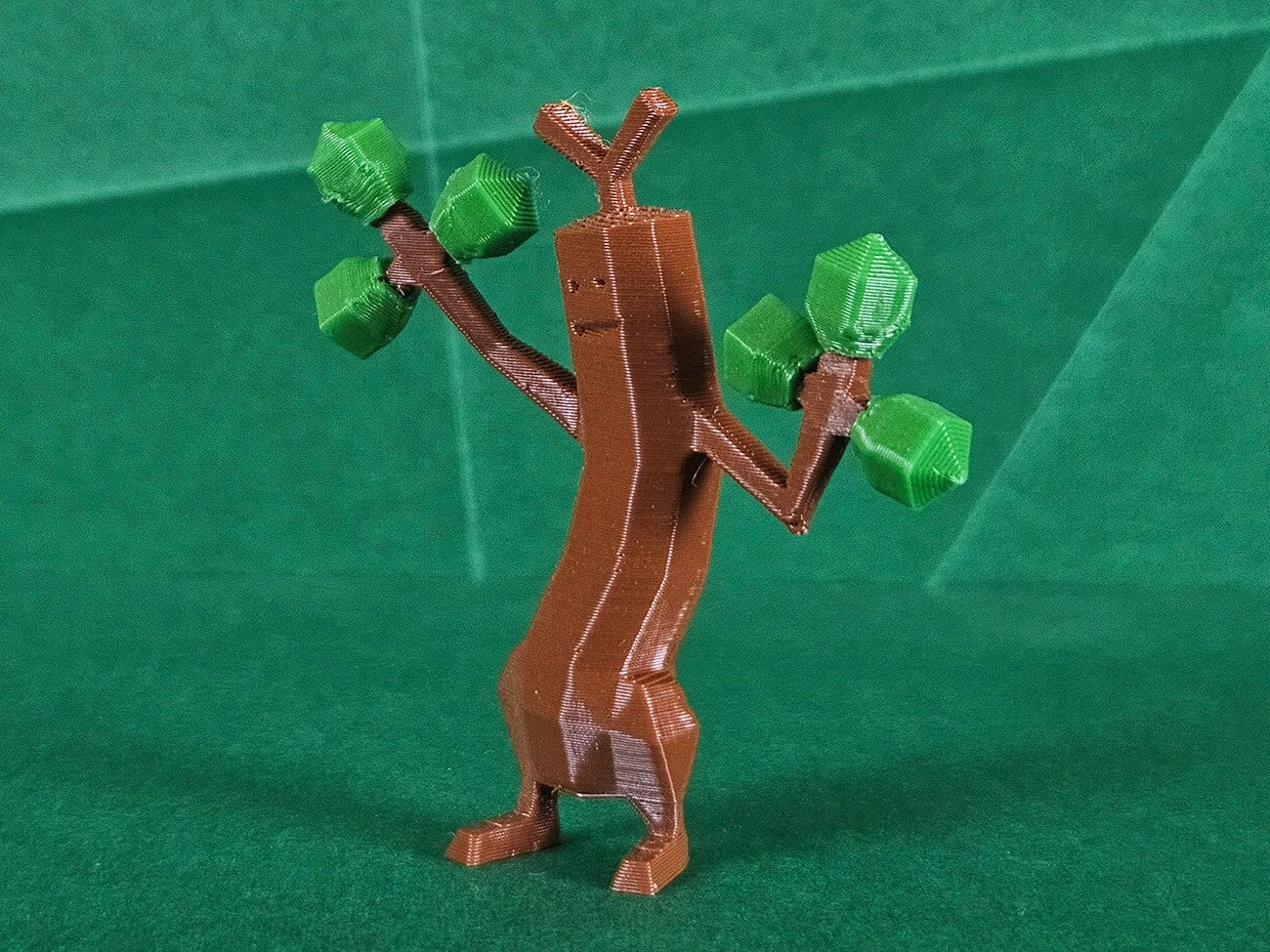 3D print preview of Sudowoodo, pixel-art tree creature with green leaves, collectible figure