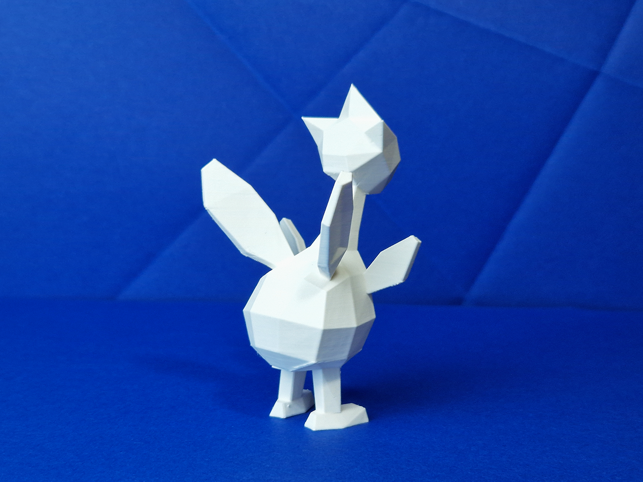 3D model render of Togetic, Pokémon collectible figure with spread wings, STL preview