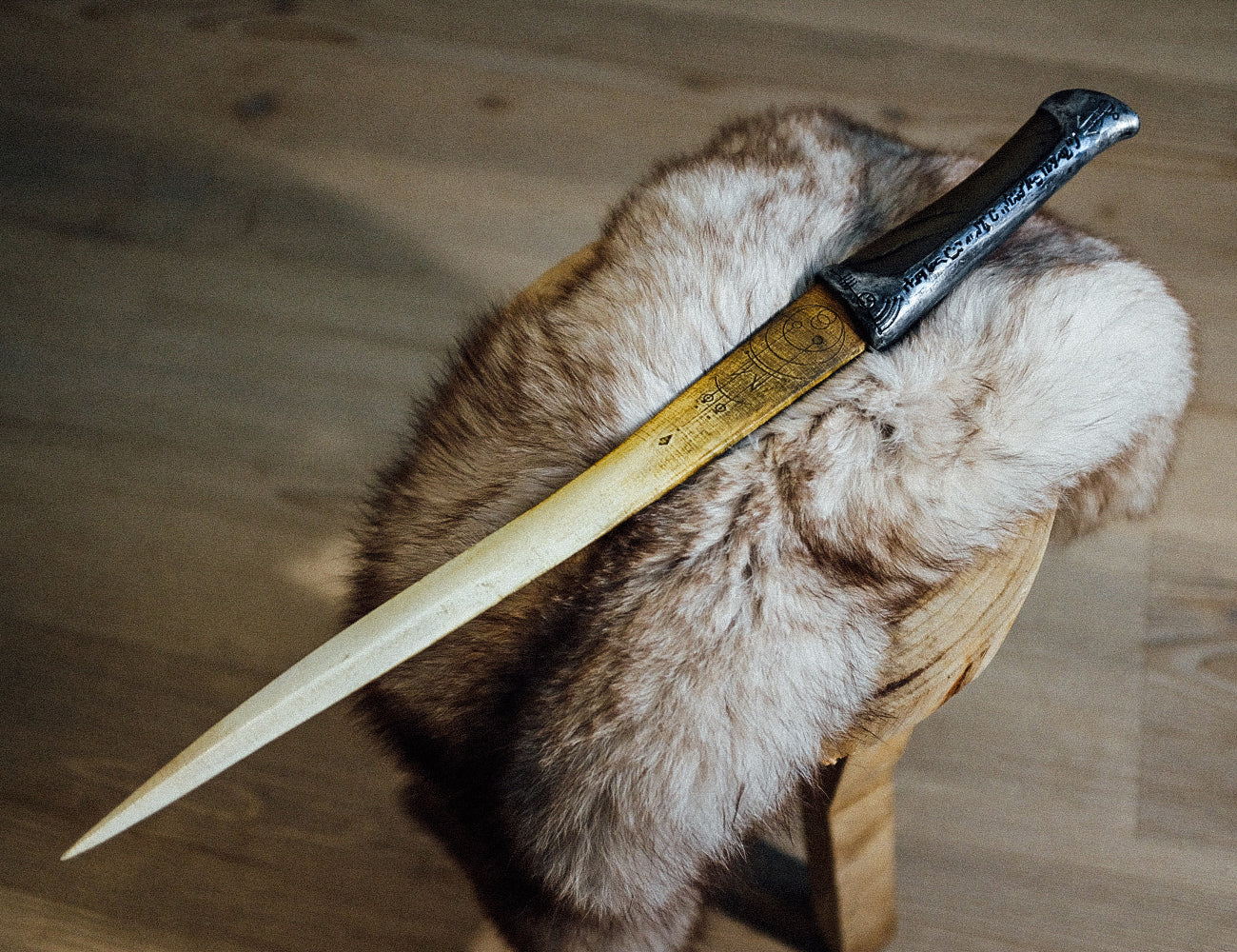 Lifestyle photo of Paul Atreides Crysknife, Dune 3D printed weapon with fur sheath, cosplay prop.