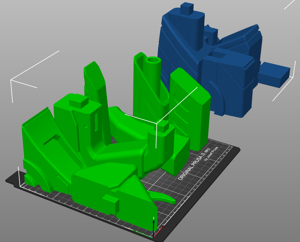 Slicer screenshot of Umbaran Blaster Pistol STL, green and blue parts on Original Prusa print bed