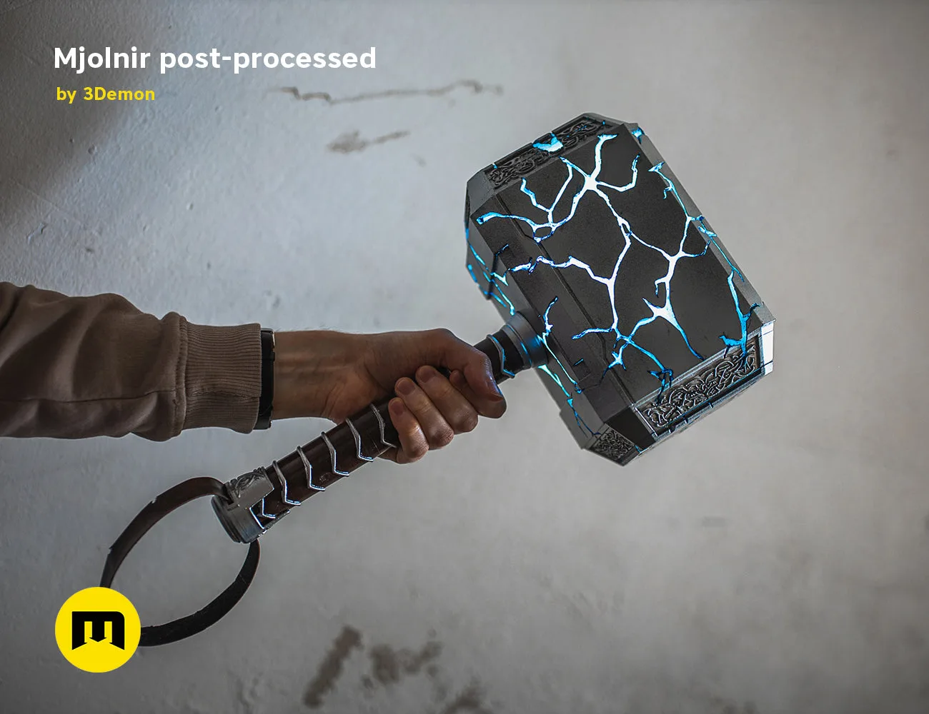 Hand photo of Mjolnir (Love and Thunder) 3D printed cosplay prop, cracked blue runes, weapon grip detail
