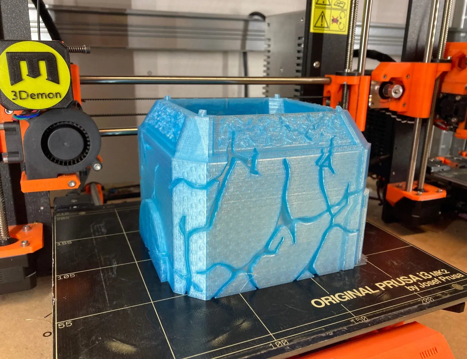 Slicer screenshot of Mjolnir (Love and Thunder) STL, blue parts on Prusa print bed