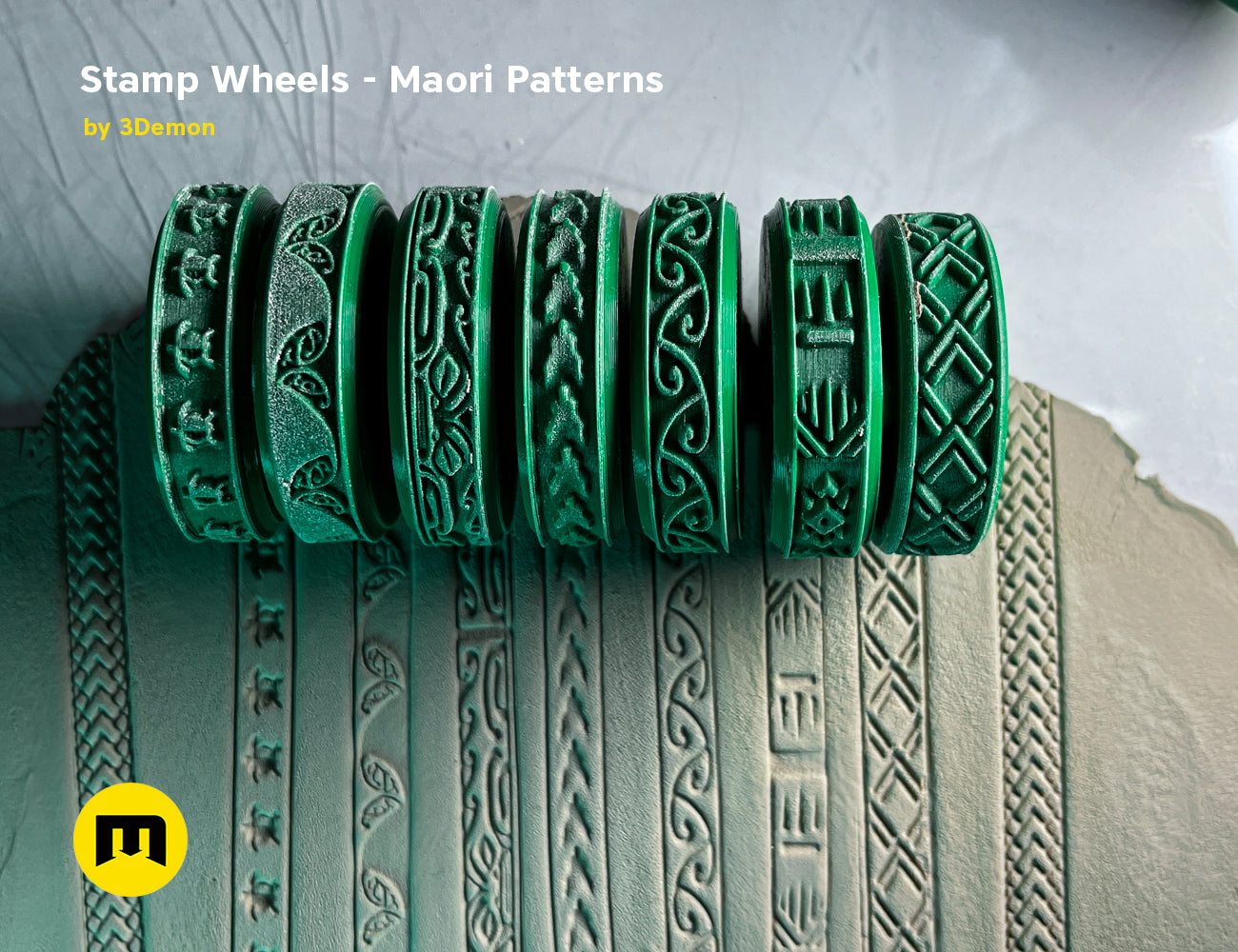 Lifestyle photo of 3D printed Maori Tattoo stamp wheels, green textured wheels with intricate patterns.