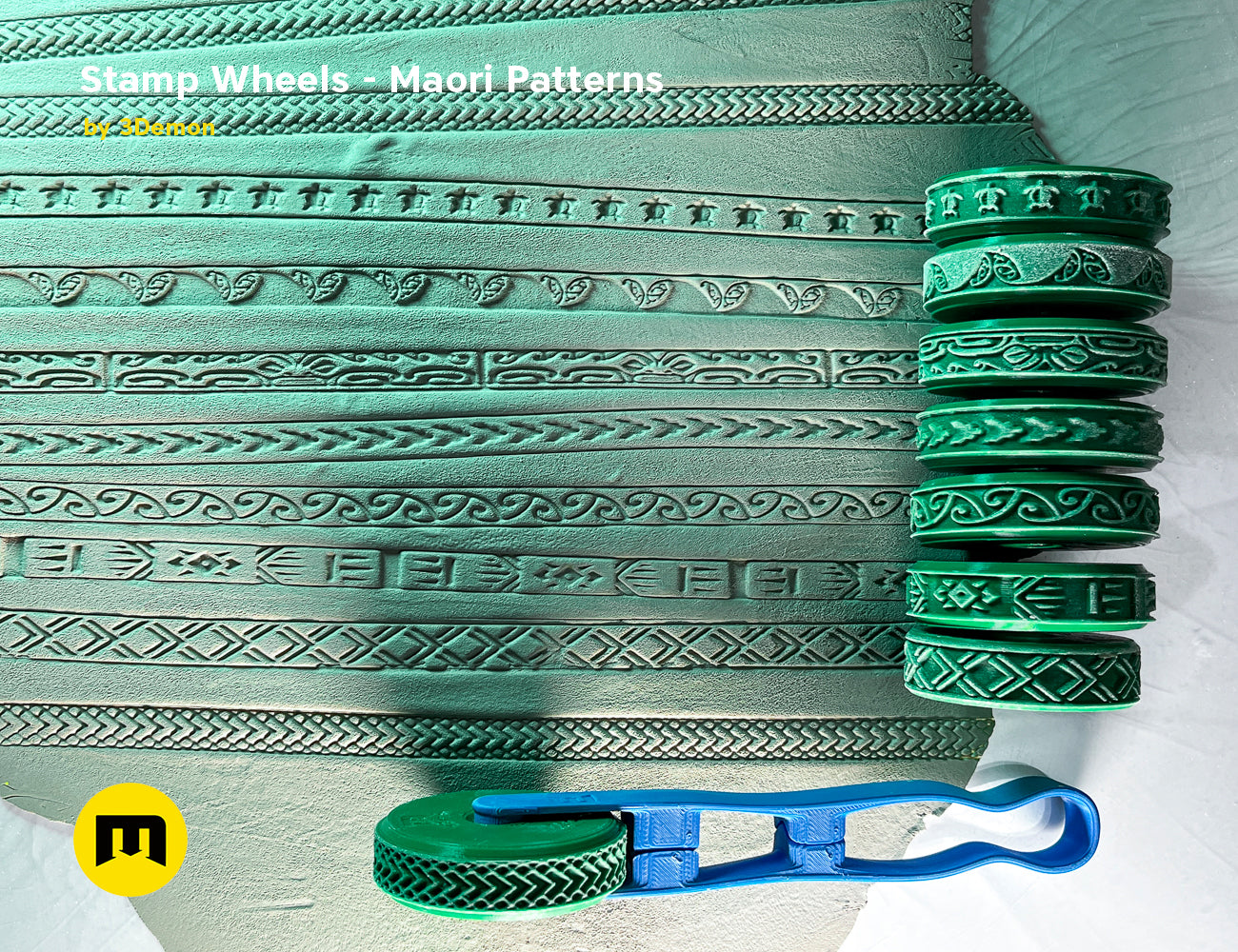 Lifestyle photo of 3D printed Maori Tattoos stamp wheels, green textured wheels with blue holder.