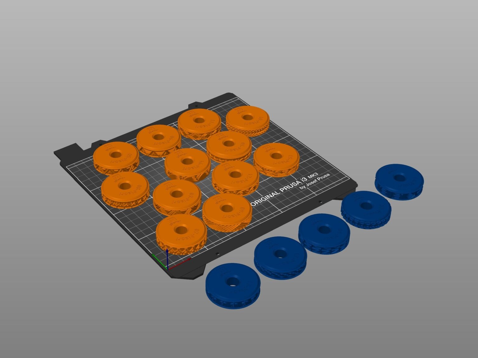 Disassembled parts of Stamp Wheels for Bodypaint — Maori Tattoos, 10 orange/blue 3D printed wheels.