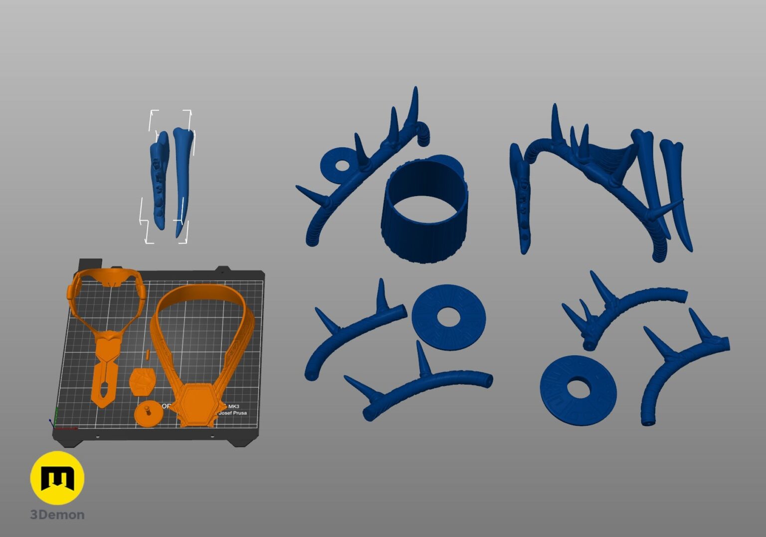 Disassembled parts of Namora Armor - Wakanda Forever, 3D printed blue segmented shoulder and chest pieces.