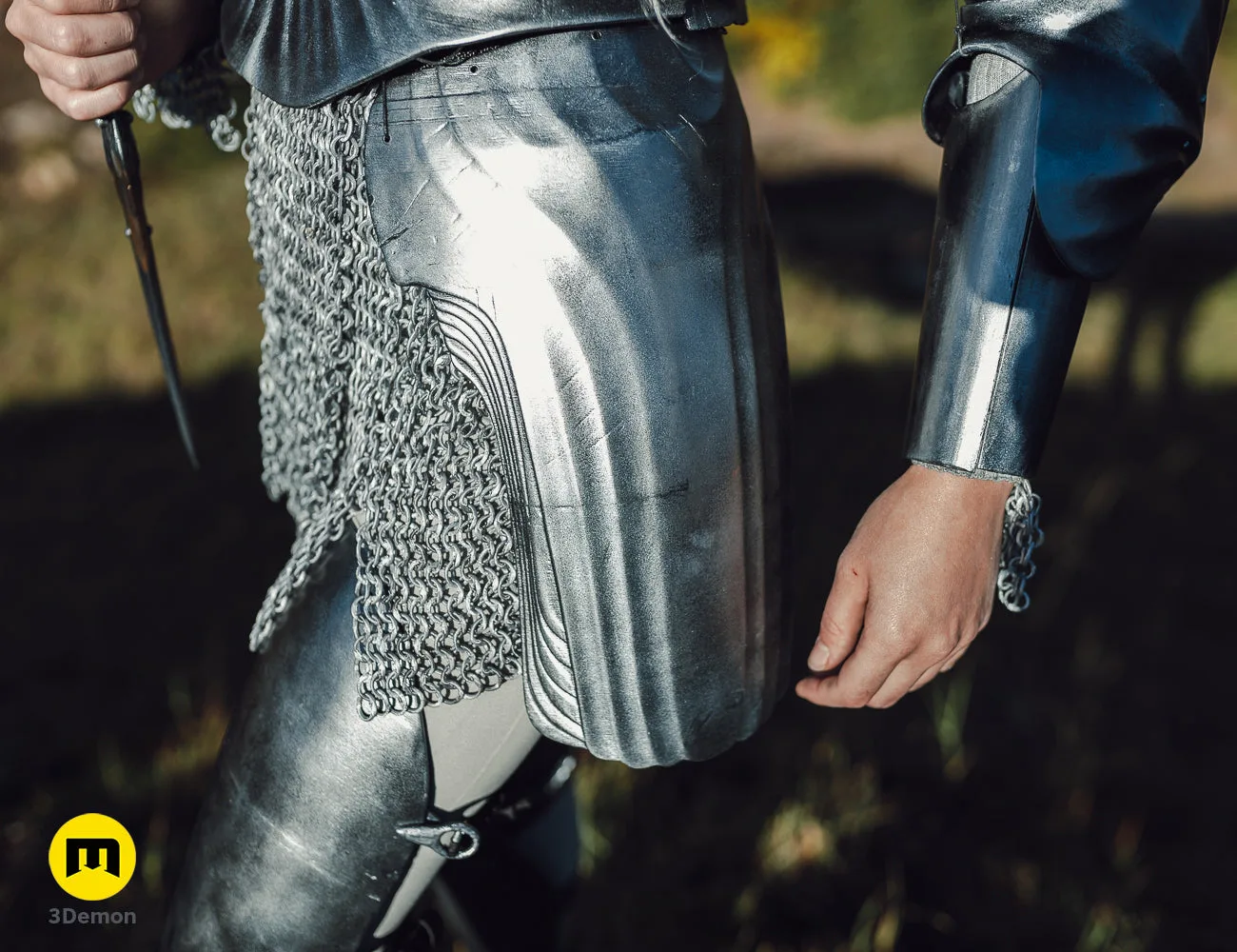 Hand photo of 3D printed Galadriel Armor - Rings of Power, silver chainmail and polished metal details.