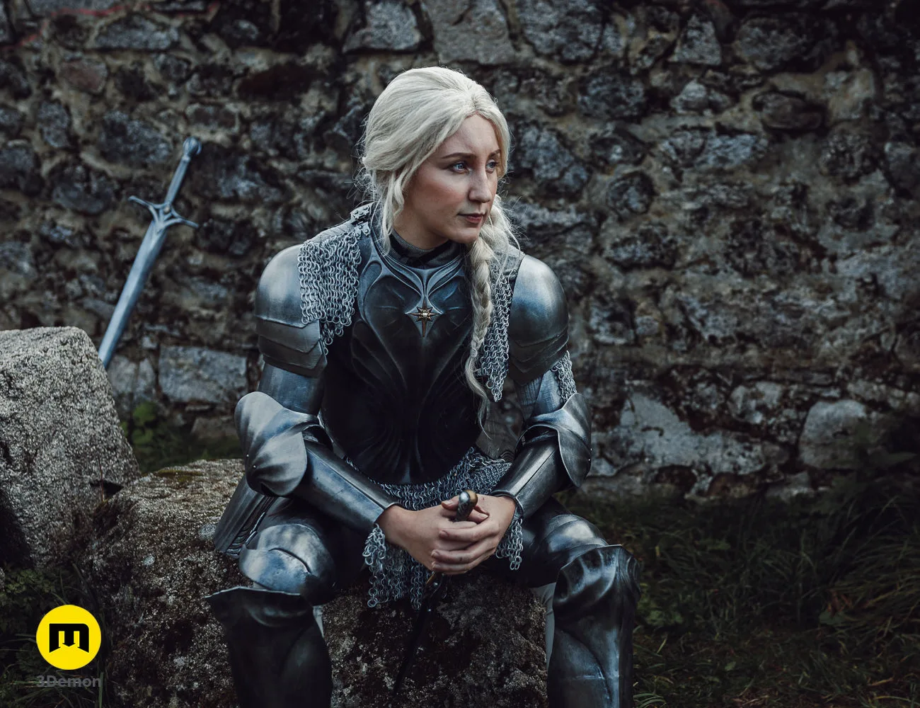 Lifestyle photo of 3D printed Galadriel Armor - Rings of Power cosplay prop, silver chainmail and dark armor.