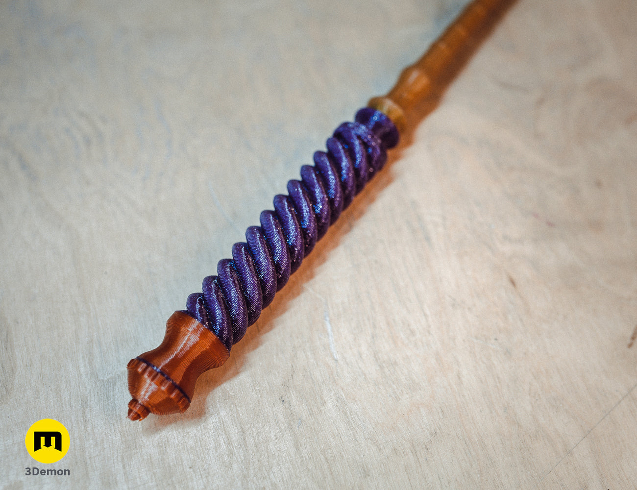 Lifestyle photo of 3D printed Hogwarts Legacy Wand Grips vol. 4, purple textured grip with wooden handle.