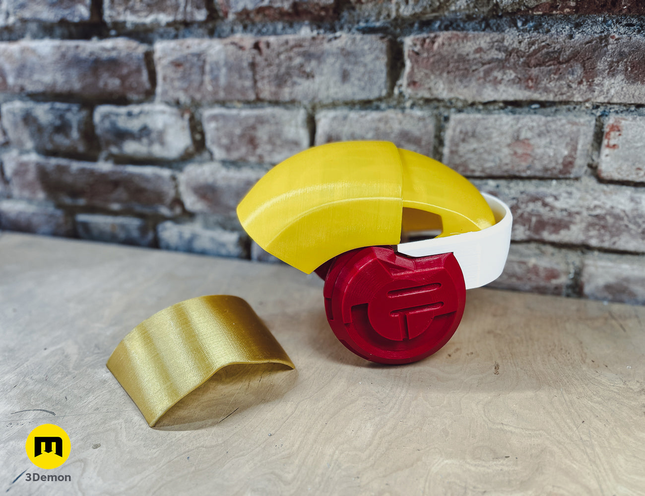 Lifestyle photo of 3D printed Sabine Speeder Helmet - Ahsoka, red base with yellow visor, two-part design.