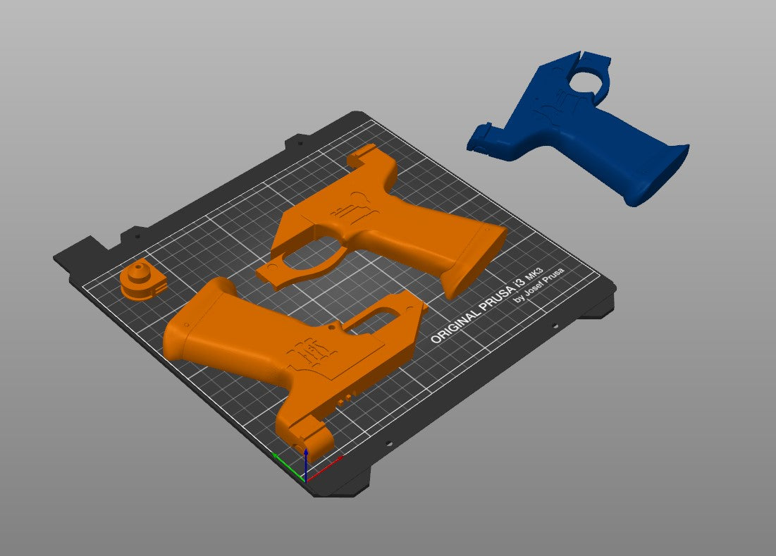 Slicer screenshot of Westar-35 Sabine Wren blasters STL, orange/blue parts on Prusa print bed