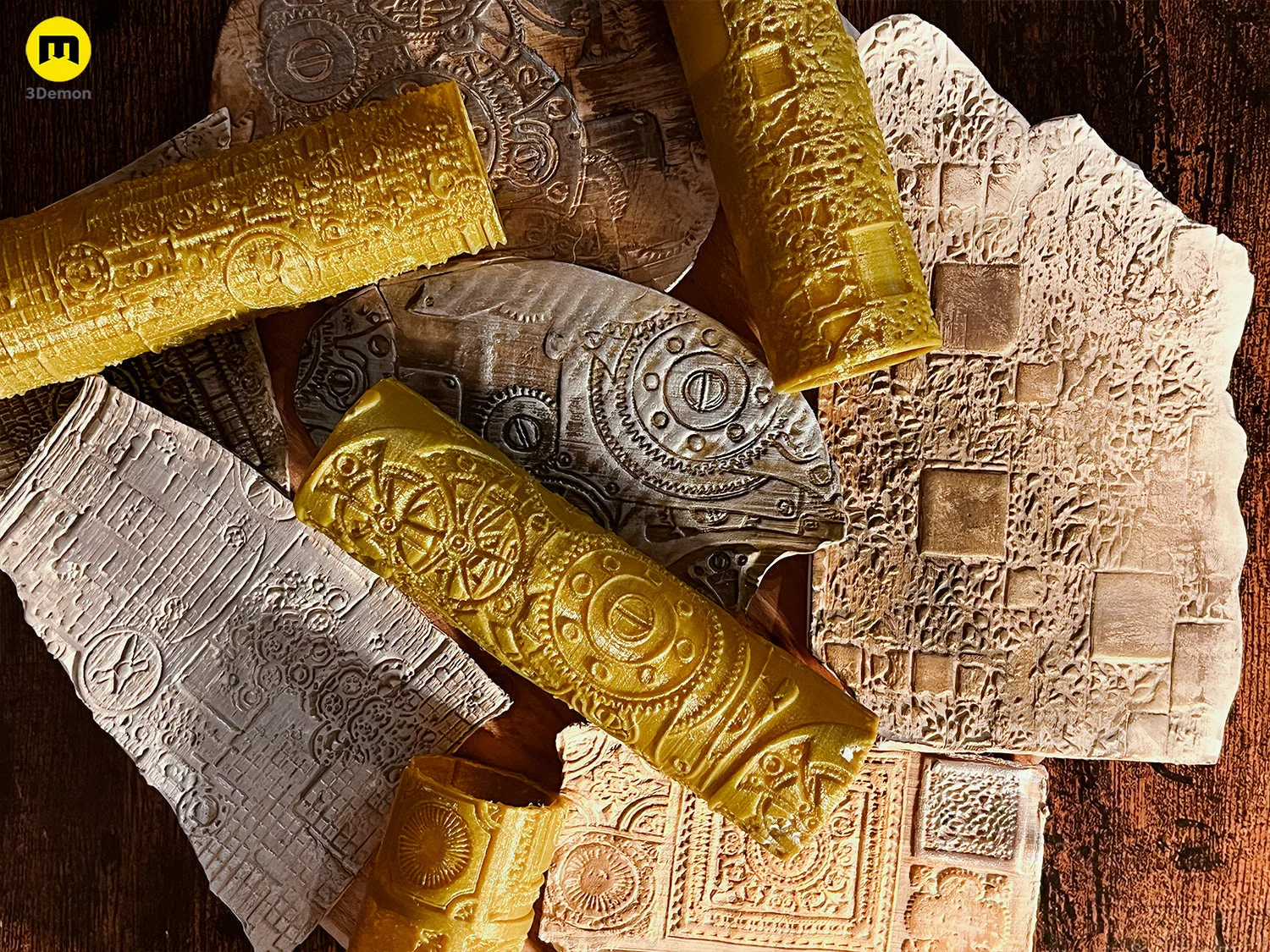 Disassembled parts of DnD Terrain Rollers – Steampunk textures, gold and bronze textured rollers, 6 pieces.