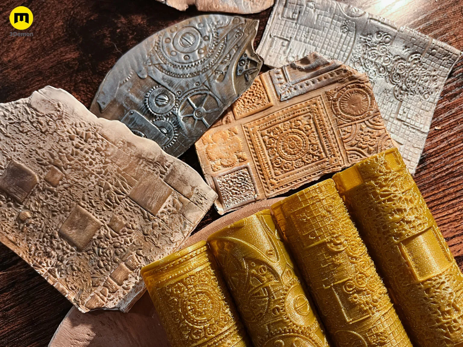 Disassembled parts of DnD Terrain Rollers – Steampunk textures, brass-gold and matte textured 3D printed rollers.