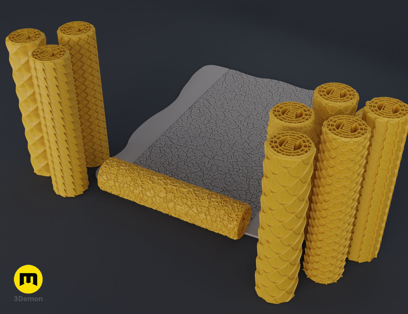 Real photo of several 3D printed rollers with dragon scale and chainmail textures on a green mat.