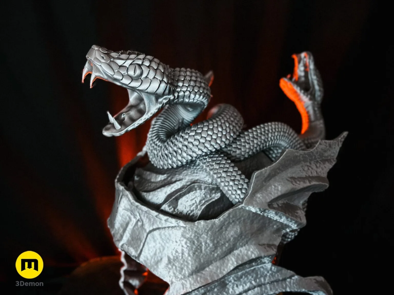 Close-up lifestyle photo of the 3D printed Messmer helmet snake details with realistic scale textures.