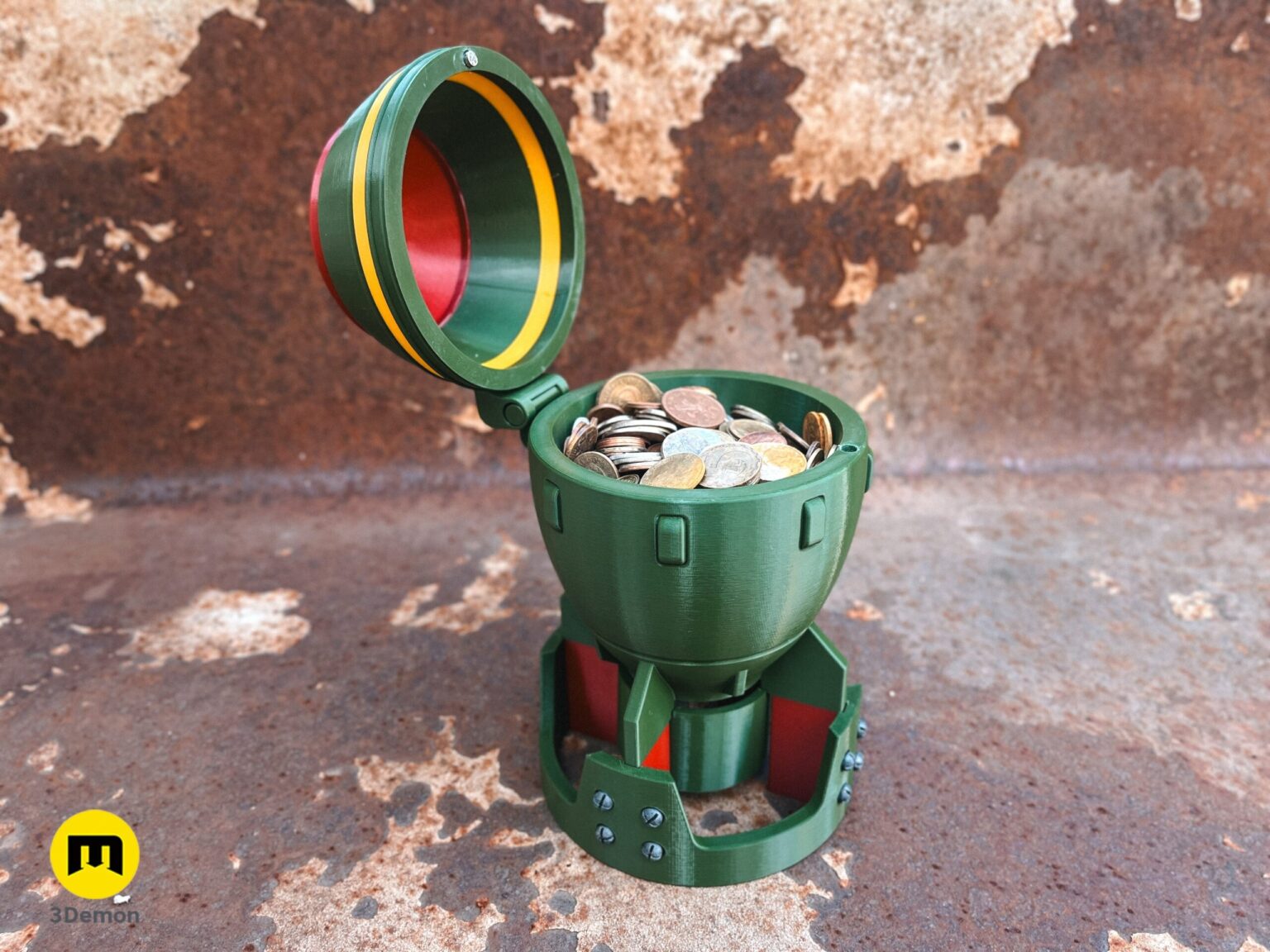 Close-up of a hand holding a 3D printed Fallout Mini Nuke bomb container, showing the fin details at the bottom.