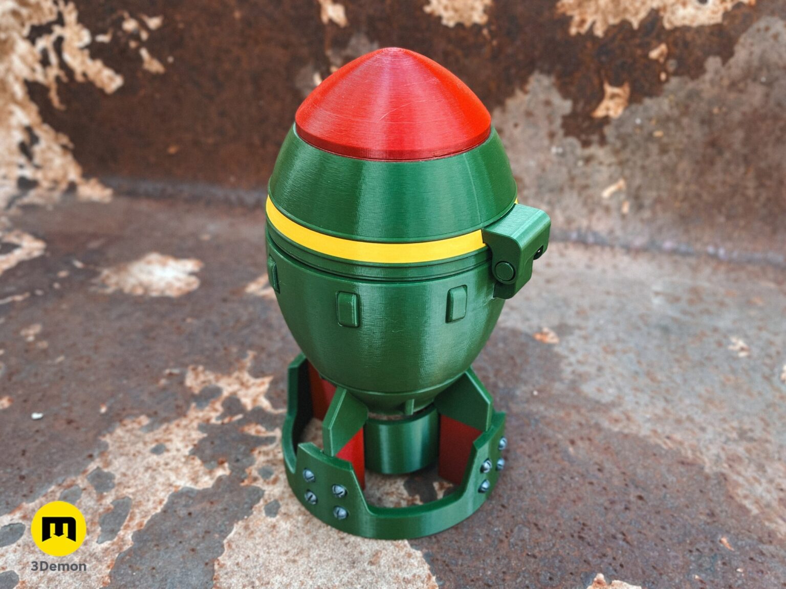 Close-up view of the 3D printed Fallout Mini Nuke bottom fin section being held by a hand.