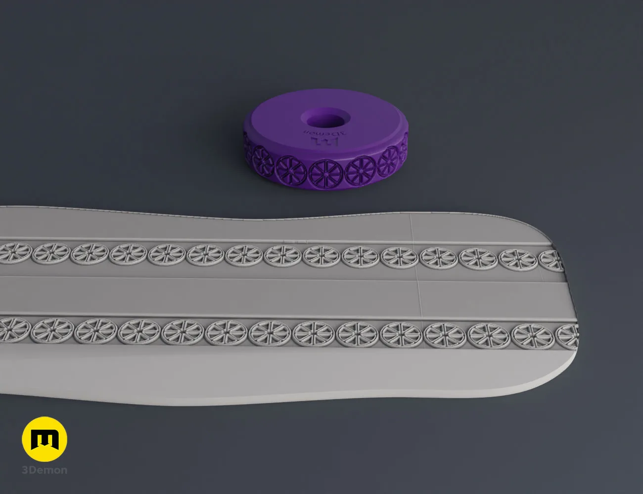 Purple 3D printed stamp wheel with a flower-shaped symbol and its impression on gray clay.