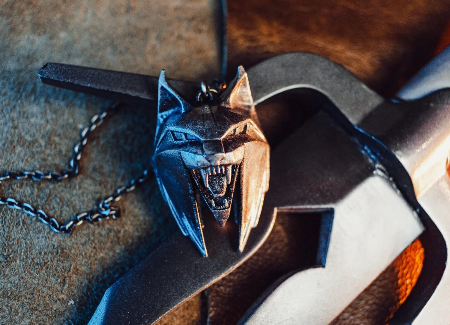 3D printed Witcher 4 Lynx medallion with metal chain on a leather surface – Witcher 4 Lynx Pendant 3D print | 3Demon