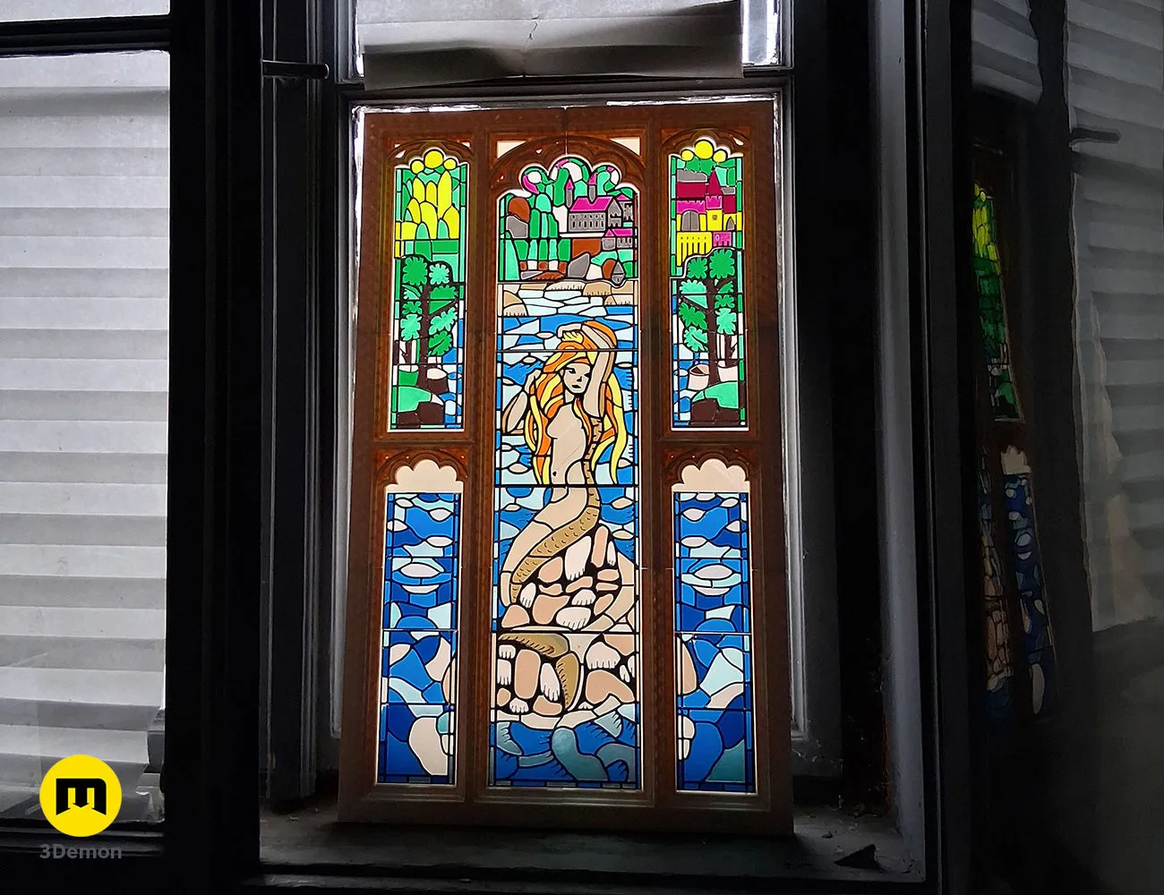 3D printed Harry Potter stained glass window with light shining through the translucent mermaid panel STL
