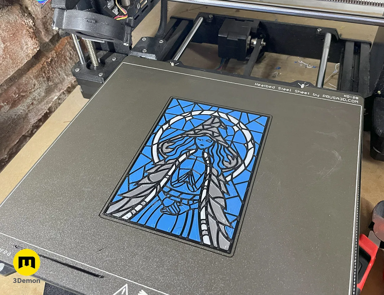 3D printed Ranni the Witch stained glass art sitting on a Prusa printer's textured steel sheet – Elden Ring Stained Glass 3D print | 3Demon