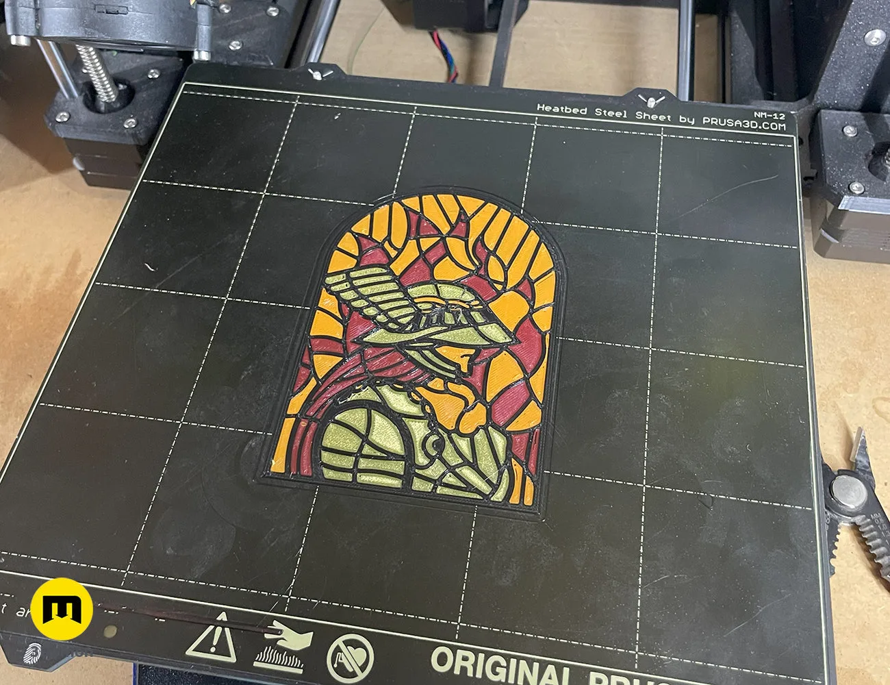 Arched Malenia stained glass panel on a 3D printer heatbed, showing freshly printed details – Elden Ring Stained Glass 3D print | 3Demon