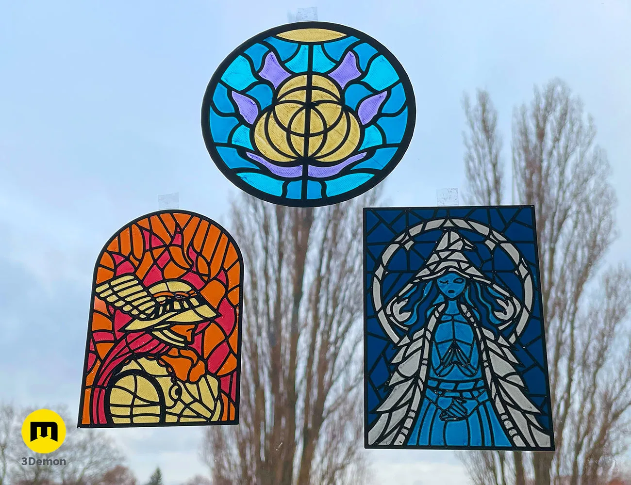 Close-up of 3D printed Elden Ring stained glass panels: logo, Malenia, and Ranni – Elden Ring Stained Glass 3D print | 3Demon