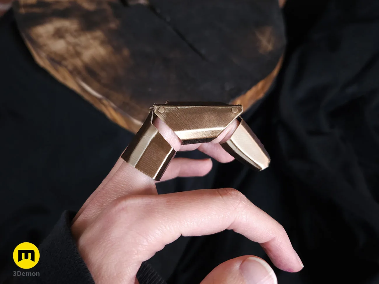 Side view of bronze 3D printed Jinx finger armor on a hand – Jinx Finger from Arcane 3D print | 3Demon