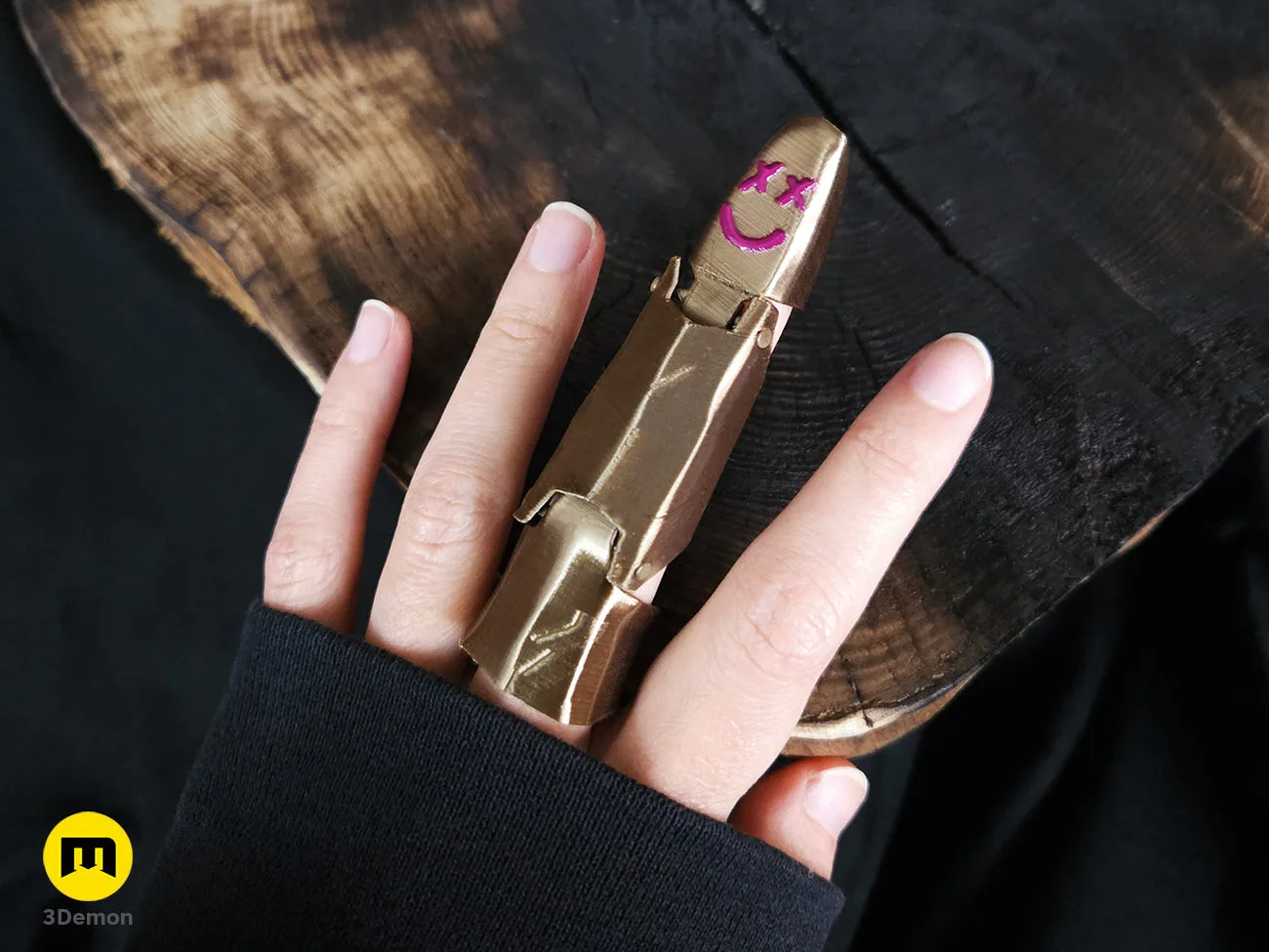 Jinx finger armor worn on a hand showing articulated joints – Jinx Finger from Arcane 3D print | 3Demon