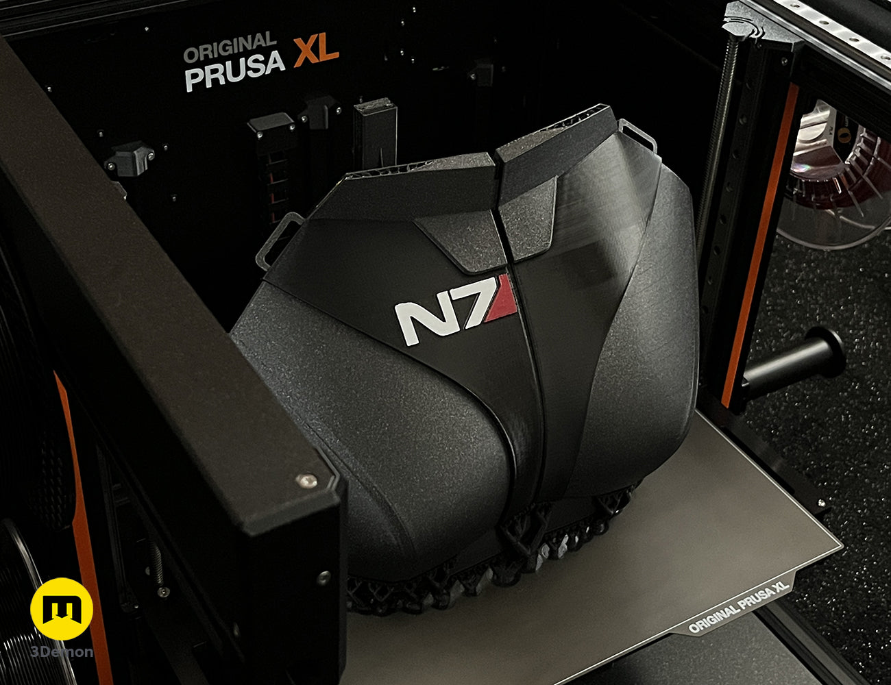 3D printed N7 female chest plate with logo on a 3D printer bed, lifestyle photo 3D print