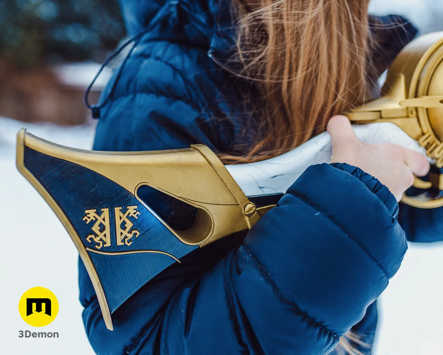 Angled side view of painted blue and gold hextech rifle 3D printed prop steampunk STL